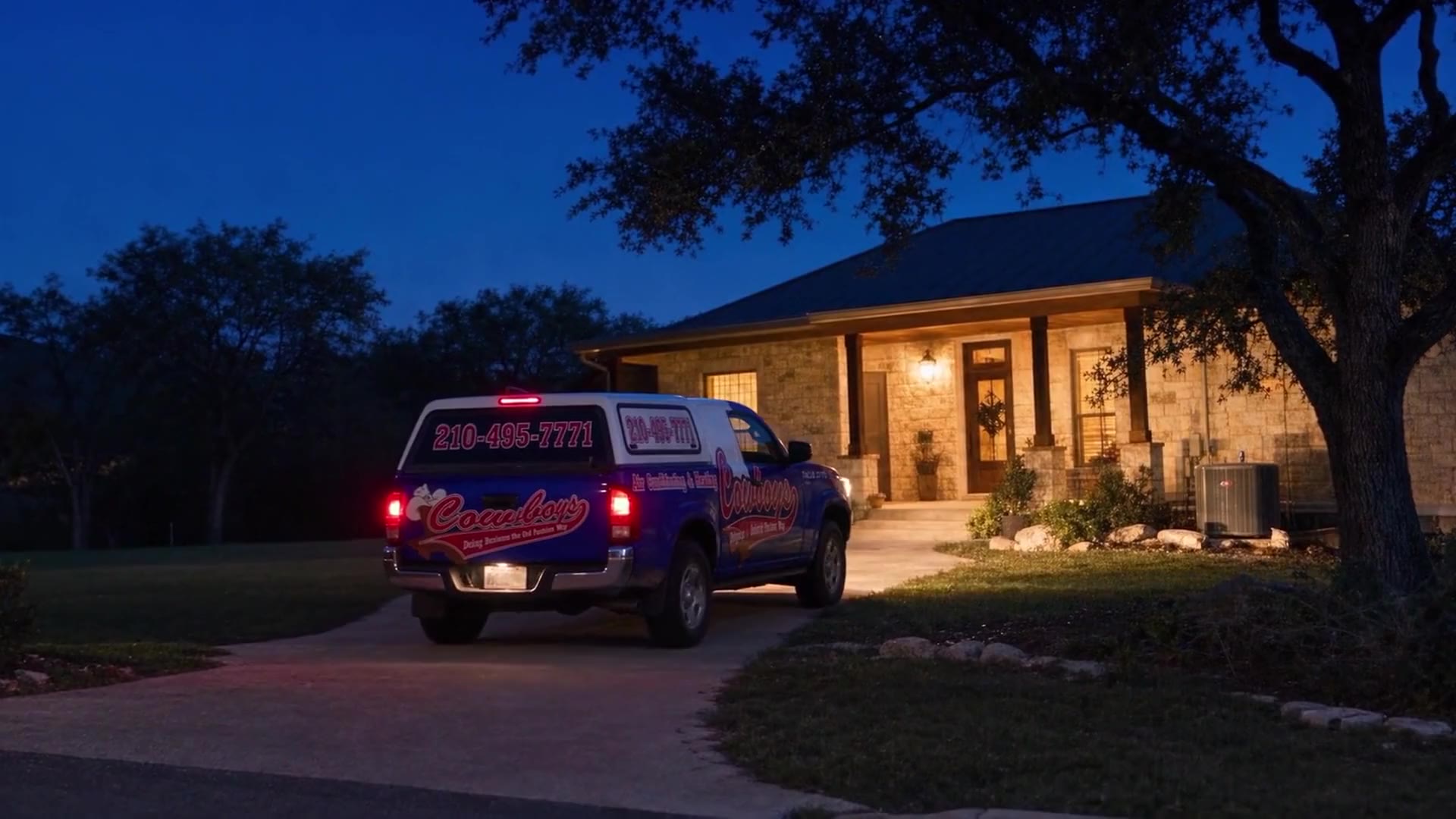 A Cowboy's Air Conditioning & Heating truck heading into downtown San Antonio, pulling up to the Cowboy's shop, then a customer's driveway